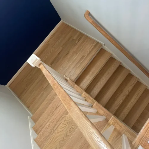 Custom stair installation and refinishing in New Jersey homes by Hollywood Flooring.